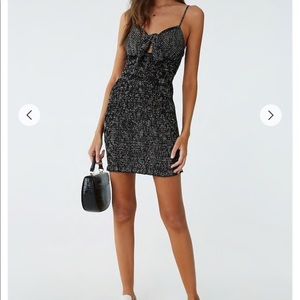 Smocked polka dot mini dress